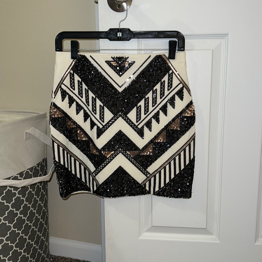 Express cream, gold, and black sequin skirt. Size s